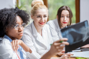 Nurse Educator looking at x-rays with nursing students